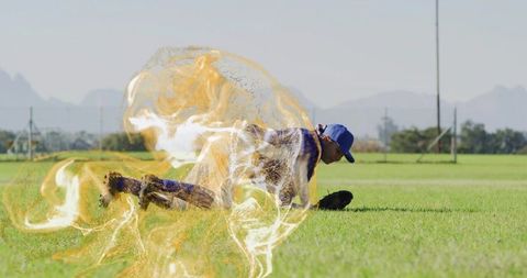 Female Baseball Player Diving with Dynamic Energetic Swirl