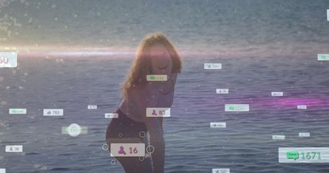 Young influencer leaning at ocean with floating social notifications and pastel lens flare