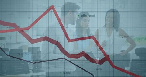 Business Team Analyzing Financial Data with Overlay of Declining Graph