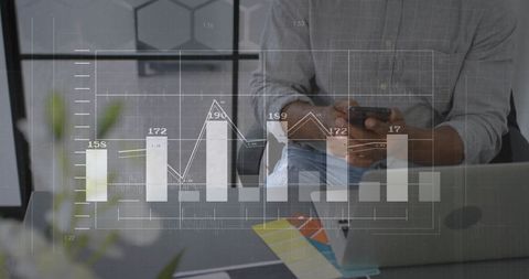 Businessman Analyzing Data on Smartphone with Digital Graphics