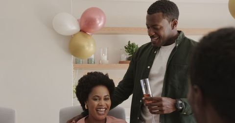 Joyful Celebration with Friends at Home Party Gathering