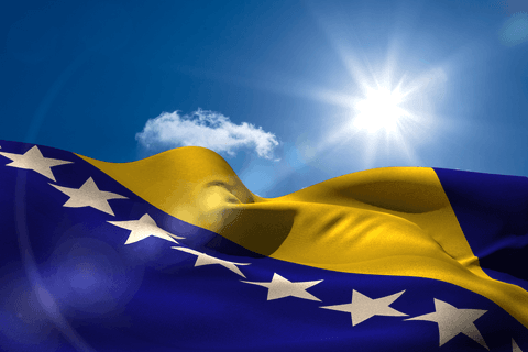 Bosnia herzegovina flag waving transparent with sunlight and sky
