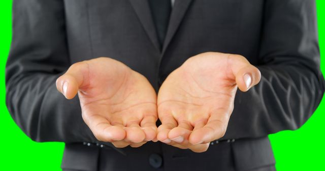 Businessman Holding Hands Out in Green Screen Background - Download Free Stock Images Pikwizard.com