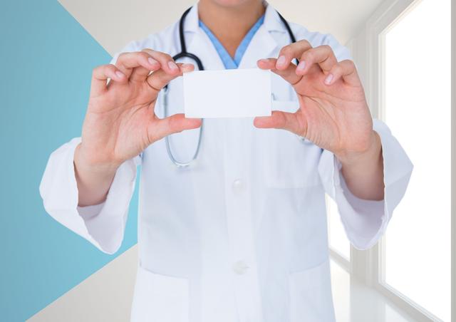 Medical professional wearing white coat and stethoscope, holding blank card. Great for healthcare advertising, medical promotions, educational brochures, hospital banners, and clinic advertisements. Versatile for displaying messages related to healthcare, wellness, and medical services.