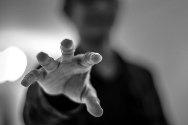 Person Extending Hand Forward in Black and White - Download Free Stock Photos Pikwizard.com