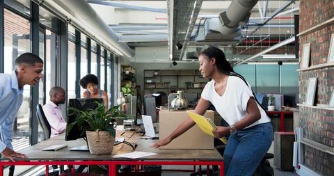 Diverse Team Collaboration in Bright Modern Office Environment