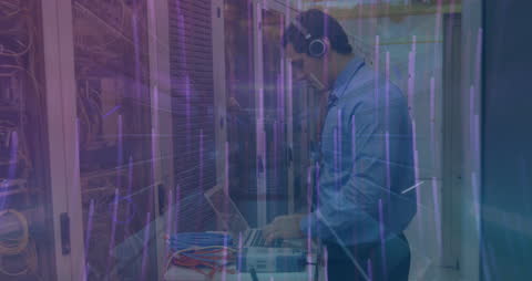 Caucasian Technician Monitoring Servers Amidst Digital Overlay