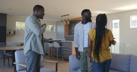 African american couple consulting with real estate agent
