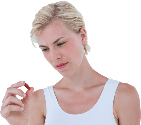 Transparent Blonde Woman Examining Red Pill Intently - Download Free Stock Videos Pikwizard.com
