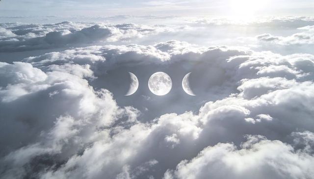 Glowing Triple Moon Floating in Misty Cloud Vortex with Sunlit Horizon and Ethereal Light