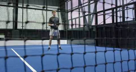 Athlete Preparing on Modern Padel Court