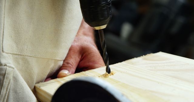 Close-Up of Carpenter Drilling Into Wood Board - Download Free Stock Images Pikwizard.com