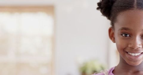 Smiling African American Girl Enjoying Comfortable Home Environment