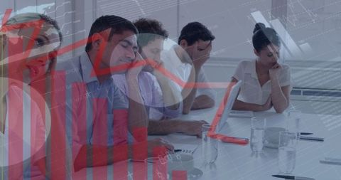 Business teamoverlaid with financial data in modern workplace