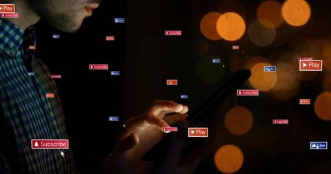 Person navigating digital interface on smartphone screen with social media icons