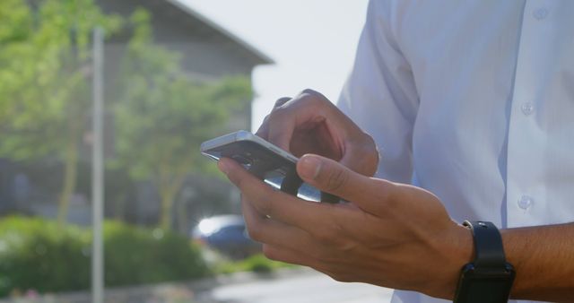 Person Using Smartphone Outdoors on Sunny Day - Download Free Stock Images Pikwizard.com