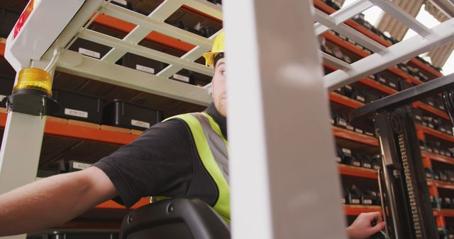 Warehouse Worker Operating Forklift in Storage Facility - Download Free Stock Images Pikwizard.com