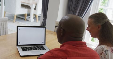 Senior Couple Enjoying Leisure Time Together at Home