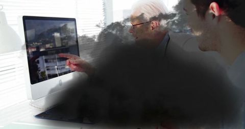 Corporate Team Collaborating on Strategy at Office Desk