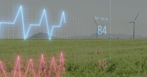 Futuristic Health Data Interface in Renewable Landscape with Wind Turbines