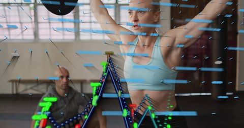 Woman Performing Overhead Barbell Lift Wearing Blue Sports Bra with AR Fitness Metrics