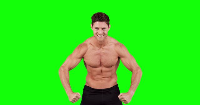 Smiling Muscular Man Flexing Biceps on Green Screen Background - Download Free Stock Images Pikwizard.com