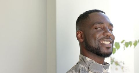 Confident African American Military Man Smiling at Home