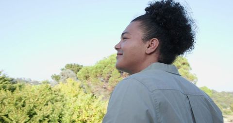 Woman Smiling Enjoying Scenic Outdoor Mountain View
