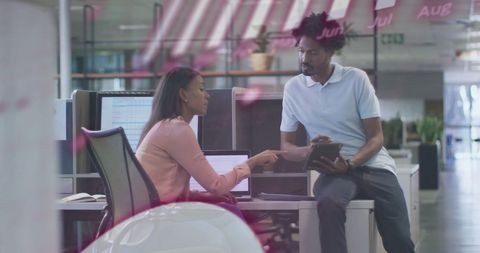 Diverse Colleagues Analyzing Data on Metallic Scaffold Structure