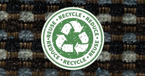 Sustainability concept: recycle symbol on patterned background