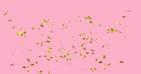 Festive gold confetti against pink background