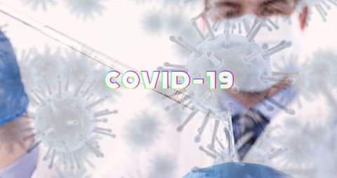 Scientist analyzing covid-19 virus model with syringe