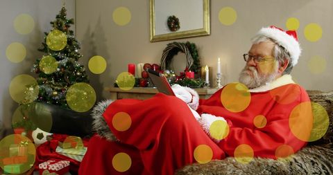 Santa Claus Reading in Festive Christmas Room with Decorations