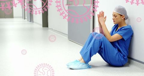 Distressed Surgeon Contemplates in Hospital for Health Awareness Concept