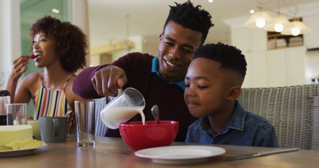 Happy African American Family Eating Breakfast Together - Download Free Stock Images Pikwizard.com