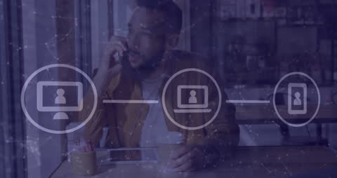 Young Professional Connecting Digitally in Modern Café