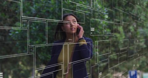Business woman using ar technology outdoors in smart office park