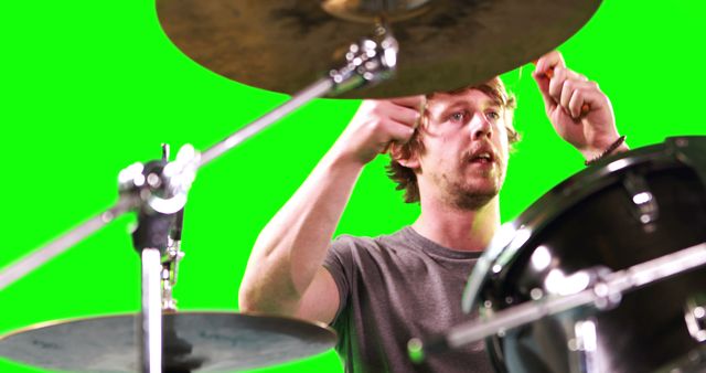 Young Musician Playing Drums on Green Screen Background - Download Free Stock Images Pikwizard.com