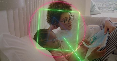 Reading Together Mother and Daughter Storytime on Bed with Neon Geometric Overlays