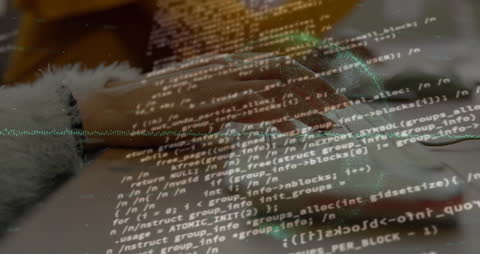 Hand Typing Code with Data Overlay Illustrating Cybersecurity