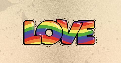 Rainbow love text with stitched outline on yellow backdrop