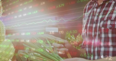 Local market vendor and customer trading fresh produce with stock market data overlay