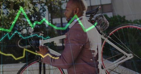 Carrying bicycle on shoulder walking through city plaza with financial data overlay
