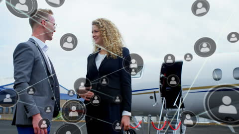 Businesspeople Smiling at Private Jet with Social Network Graphics