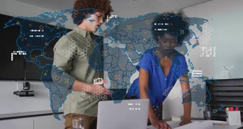 Diverse Professionals Analyzing Global Data on Laptop