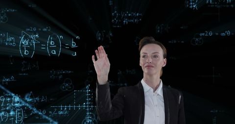 Businesswoman Engaging with Virtual Technology for Financial Analysis - Download Free Stock Images Pikwizard.com