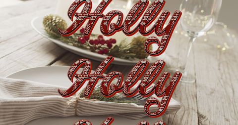 festive christmas table with holly and holiday greeting - Download Free Stock Images Pikwizard.com