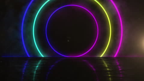 Vibrant Neon Circles Over Reflective Surface