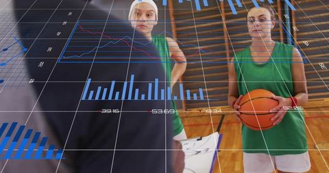 Female basketball players receiving coaching holding ball with performance analytics overlay