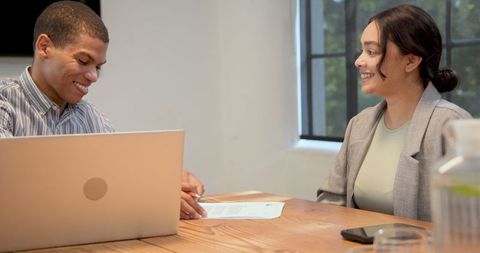 Multiracial colleagues engaged in business discussion and collaboration